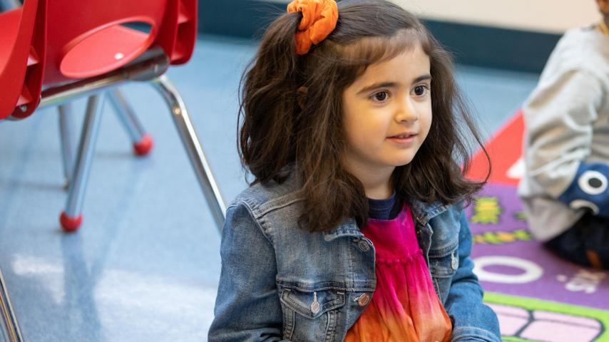 young child learns in building blocks program
