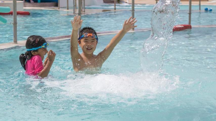 children swimming at Mesquite Groves