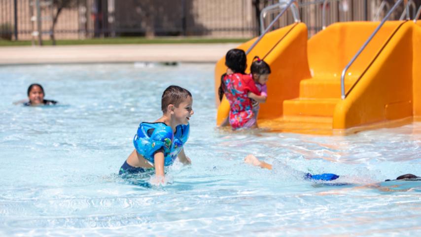 kids playing in the water at arrowhead pool