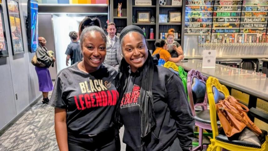 Two participants at a BHM event
