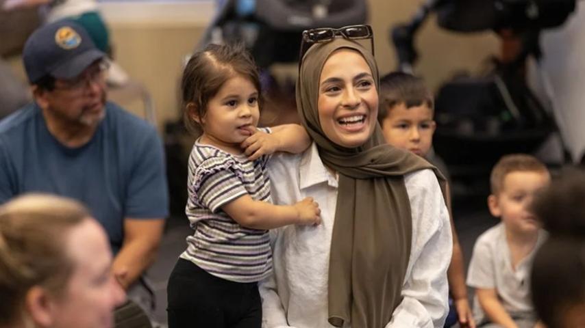 Mom and toddler at a city event