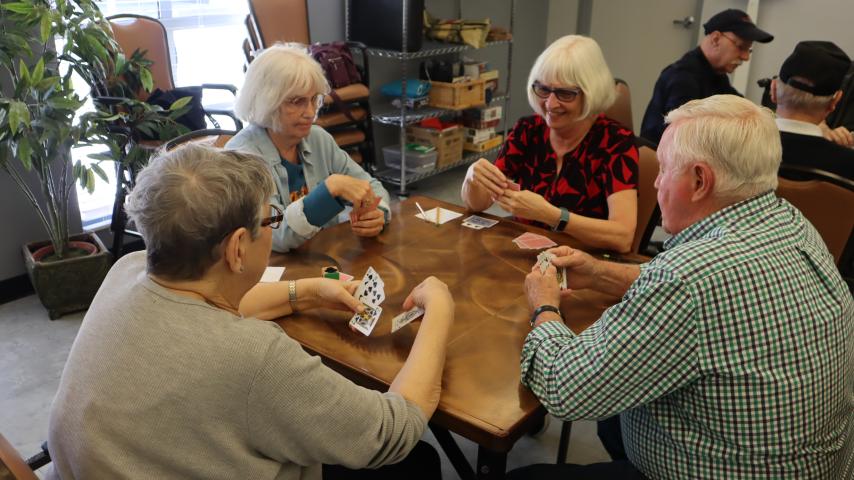 seniors playing cards