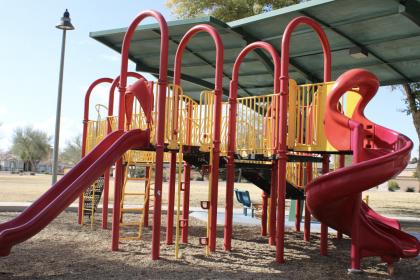 Playground slides and climbing features at La Paloma Park