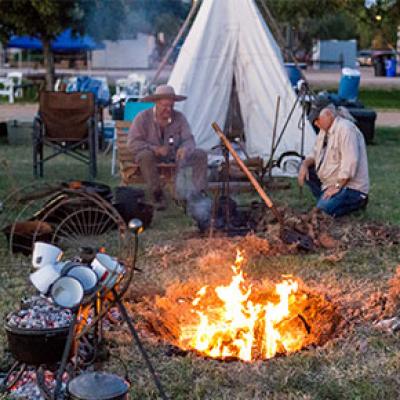 Sitting by the fire at the 2017 Chuck Wagon Cookoff