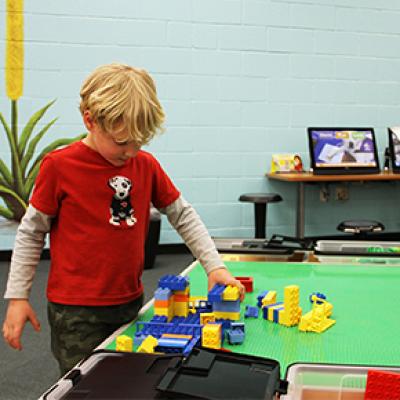 Young boy playing with blocks