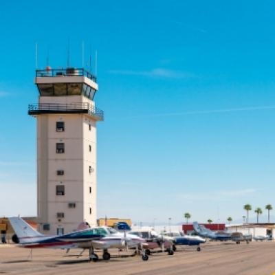 CHD Tower flanked by a row of planes