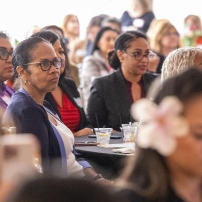 2024 WEL attendee listening to speaker
