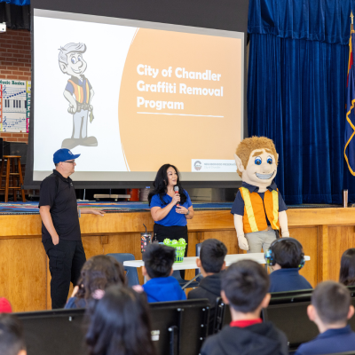 Tim Tapia, Erica Barba and Eli the Graffiti Eliminator Elf presented info about graffiti to elementary school students