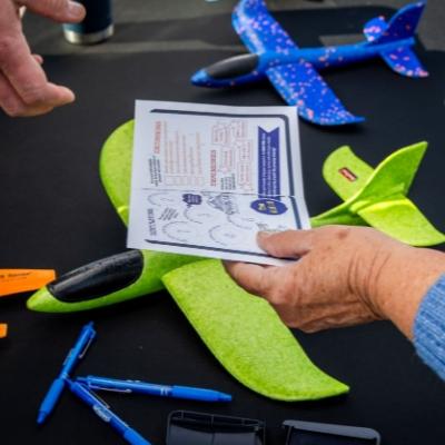 Paticipant getting passport stamped at Airport Day