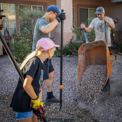 For Our City Day volunteers helping landscape a yard