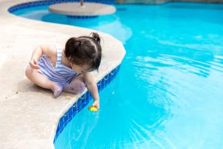 toddler by the pool