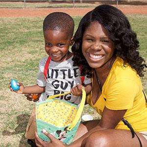 Toddler boy and mom with Easter basket at Chandler Family Easter Celebration