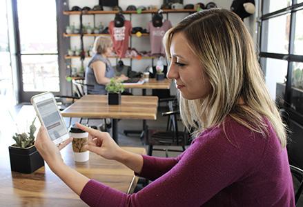 Woman on phone taking budget survey
