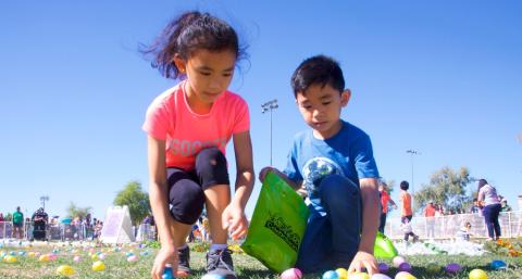 photo showing children collecting eggs at Family Easter Celebration in Chandler
