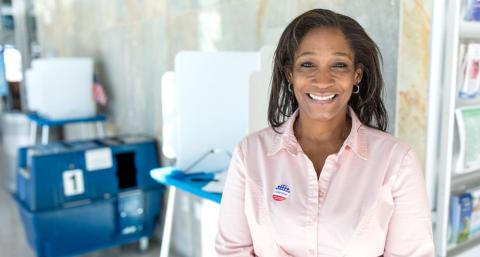 Female voter at a polling location