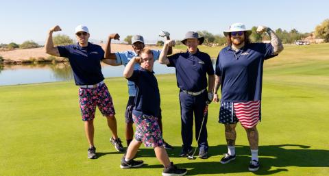 golfers posing on golf course during Chandler Golf Challenge event