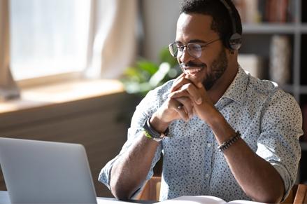 Man using a computer at home