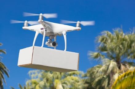 Drone carrying package for delivery