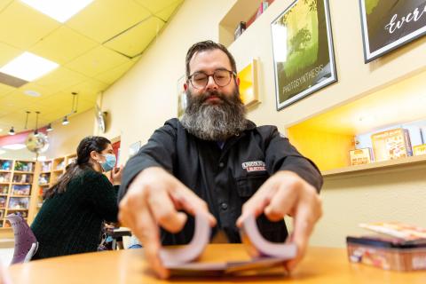 photo showing card player at Chandler Public Library