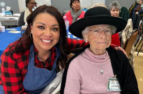 Priscilla Quintana with Neighborhood Programs and a Golden Neighbor at last year's Holiday Breakfast