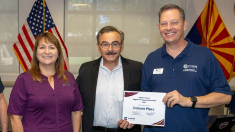 Neighborhood Resources Director Leah Powell, Councilmember Matt Orlando and a representative from Dobson Place - winner of the People's Choice award in 2023