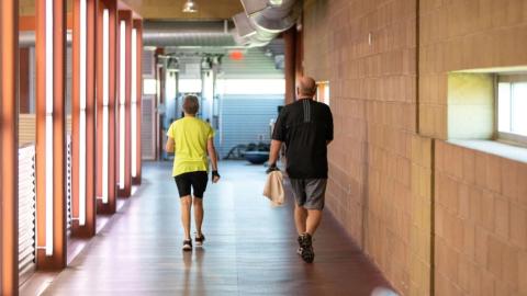 Two people walking at the TRC