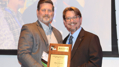 CHD Airport Manager Ryan Reeves accepting an award during AzAA Conference
