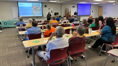 Oak Street Health presenting to Golden Neighbors event attendees