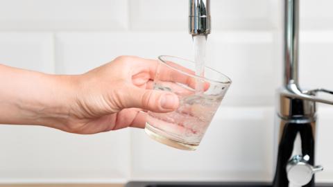 Filling a glass with water