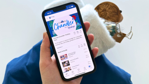 Cell phone with Choose Chandler Holiday Pass onscreen