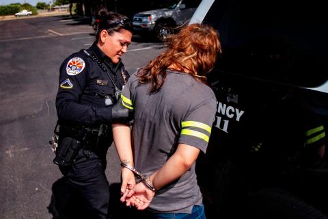 Police-Officer-Arrests-Suspect