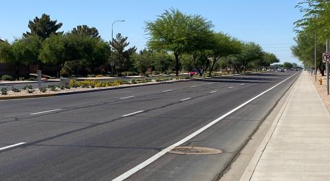 Road in Chandler Arizona showing sidewalk, lanes and median