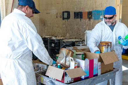 Chandler staff sorting hazardous waste materials