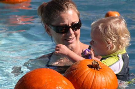 Mom and daughter in the pool at Pumpkin Dunk