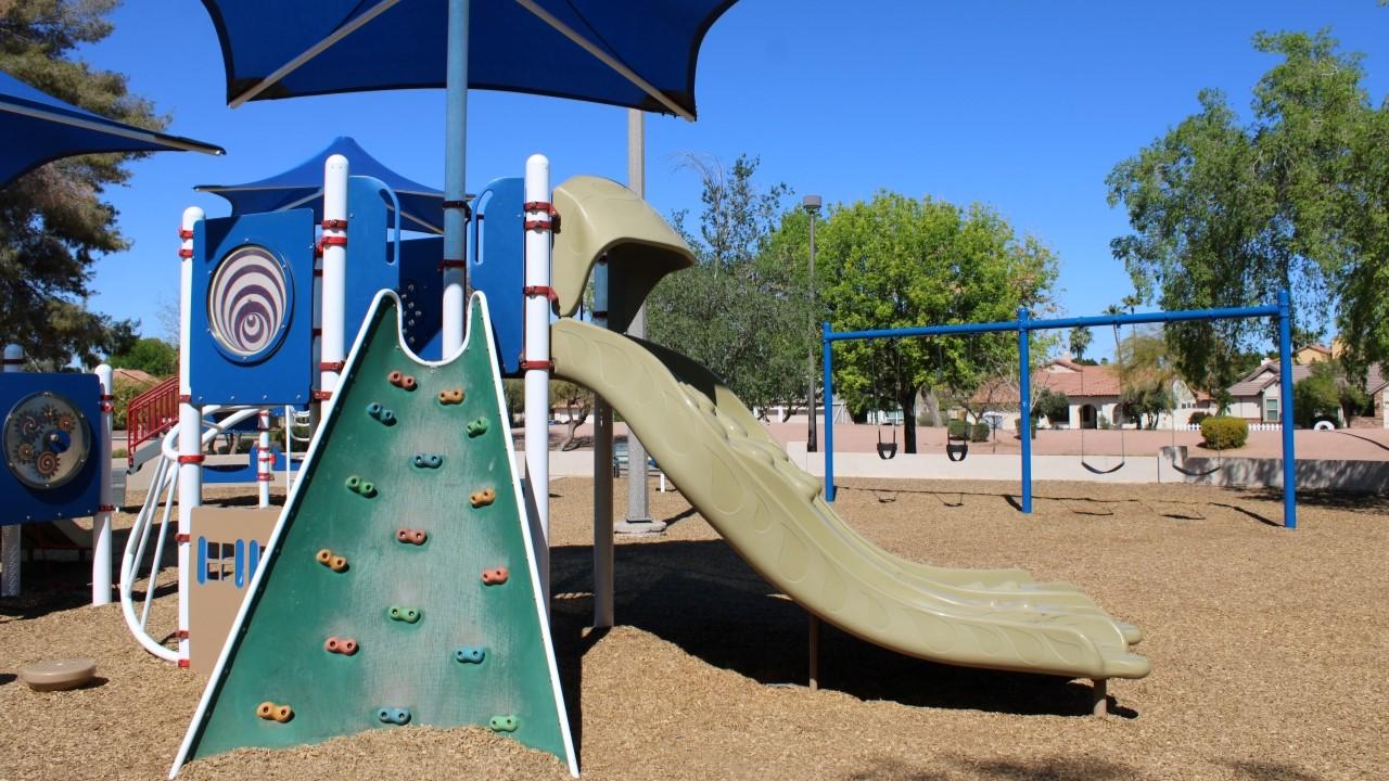 Playground climbing wall and slide at Amberwood Park