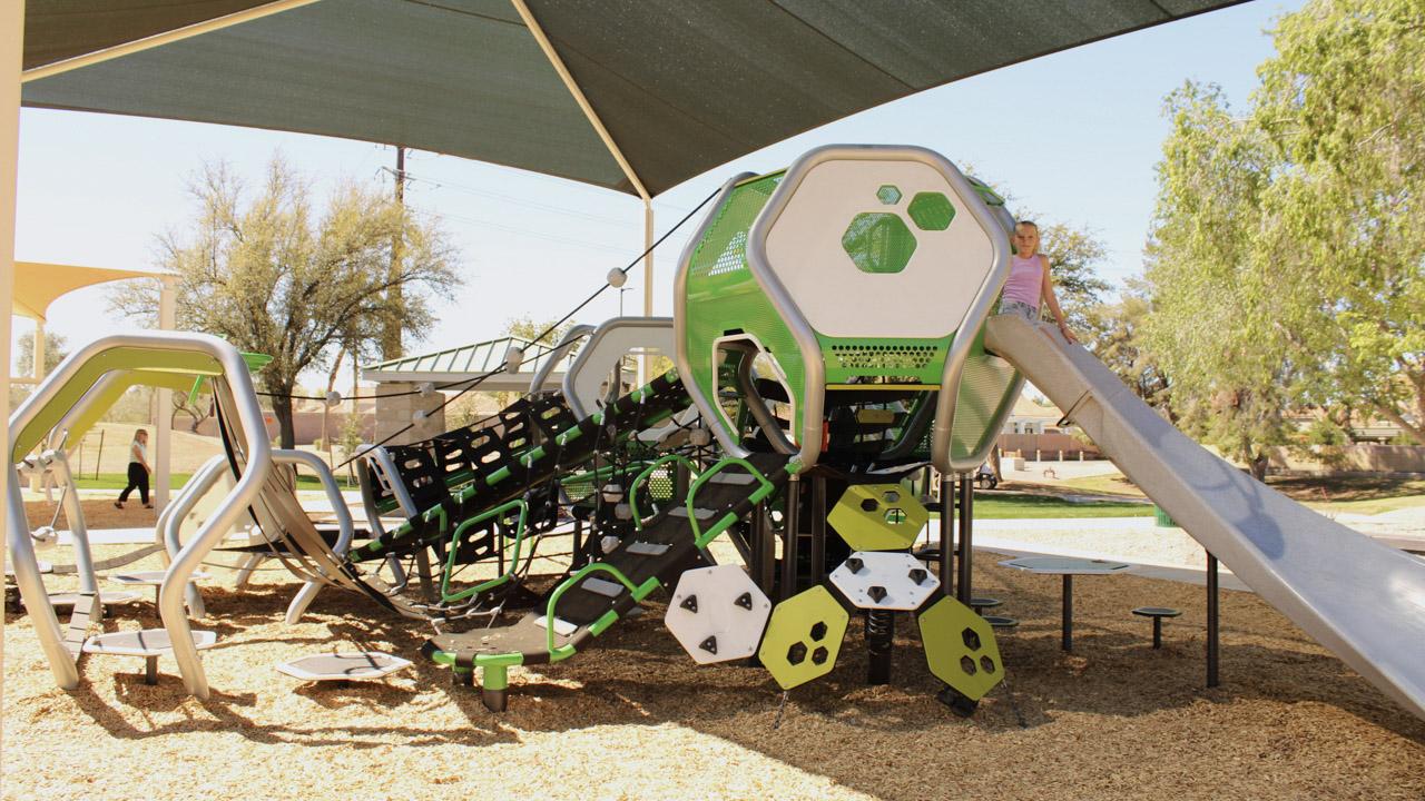 Playground slide and climbing walls at Brooks Crossing Park