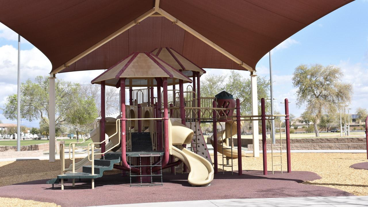 Playground monkey bars and slides at Chuparosa Park