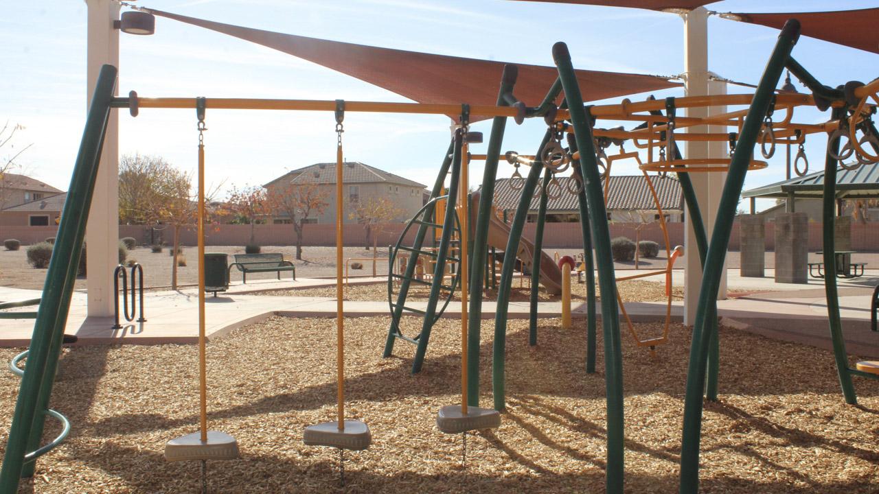 Play structure with monkey bars at Crossbow Park
