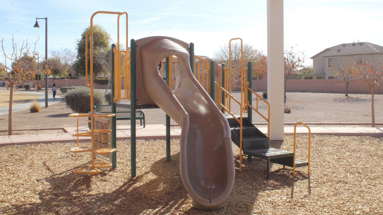 Play structure with slide at Crossbow Park