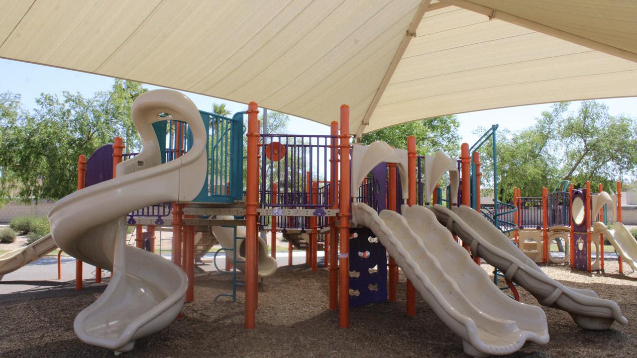 Playground slides and climbing walls at Espee Park