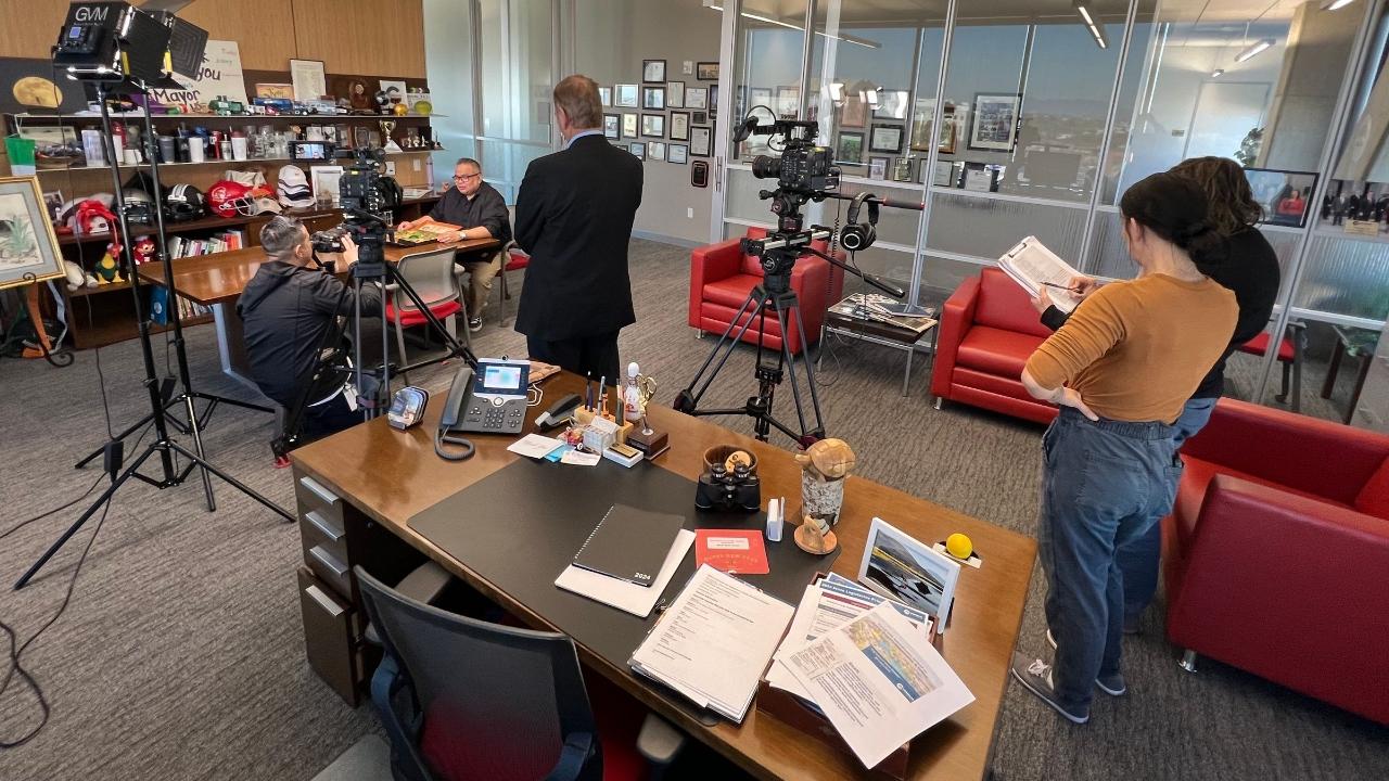 filming state of the city in the mayor's office