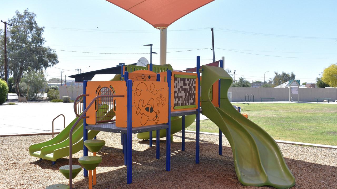 Play structure with slides and steps at Harris Park