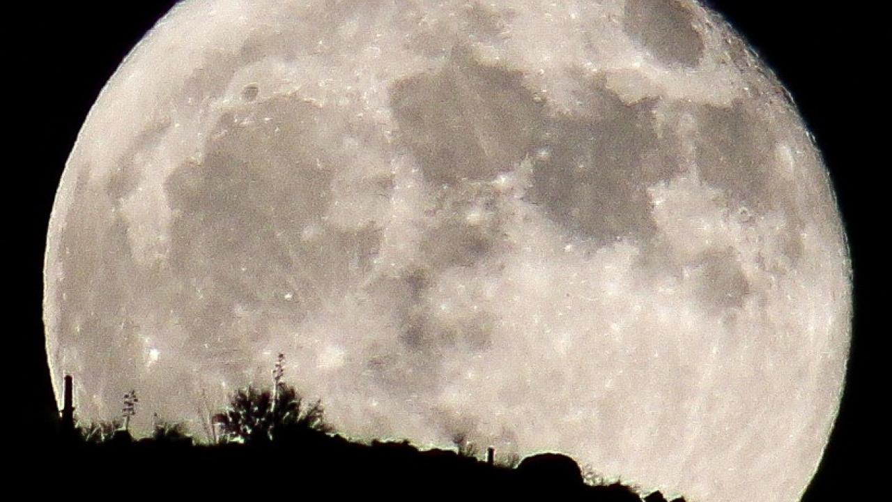 First Place Julie H moon rising over landscape