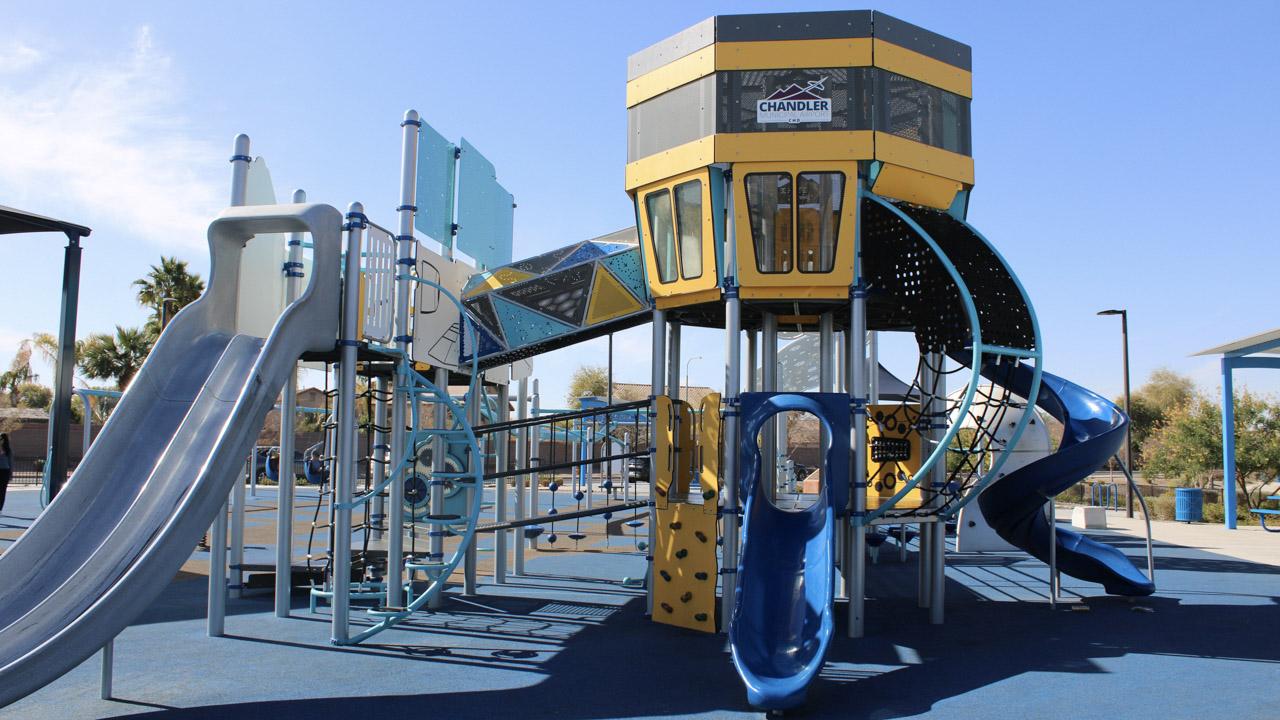 Playground slides and tower at Lantana Ranch Park