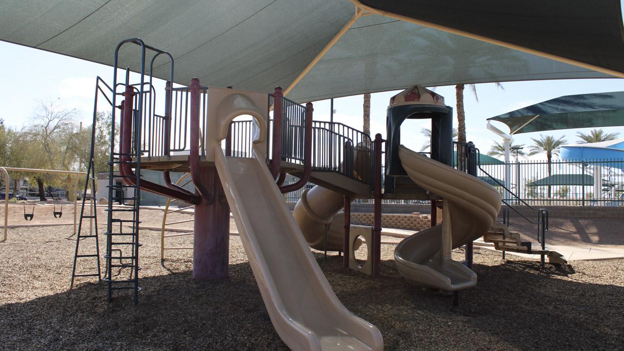 Playground slides and climbing feature at Nozomi Park