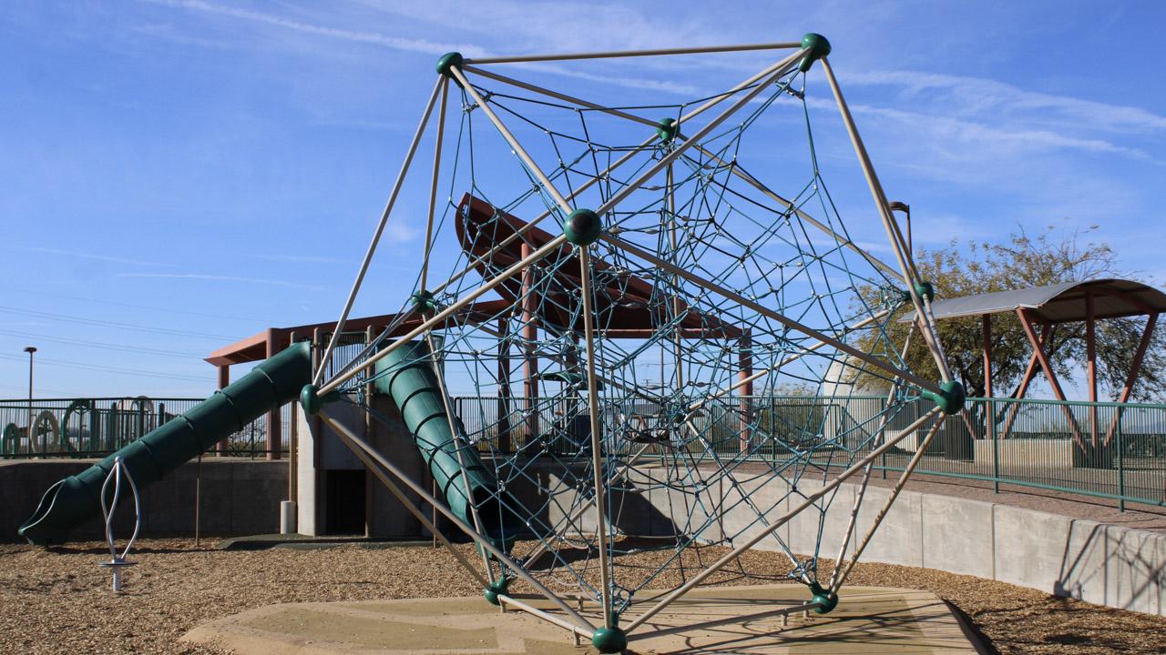 Playground climbing tower at Paseo Vista Recreation Area
