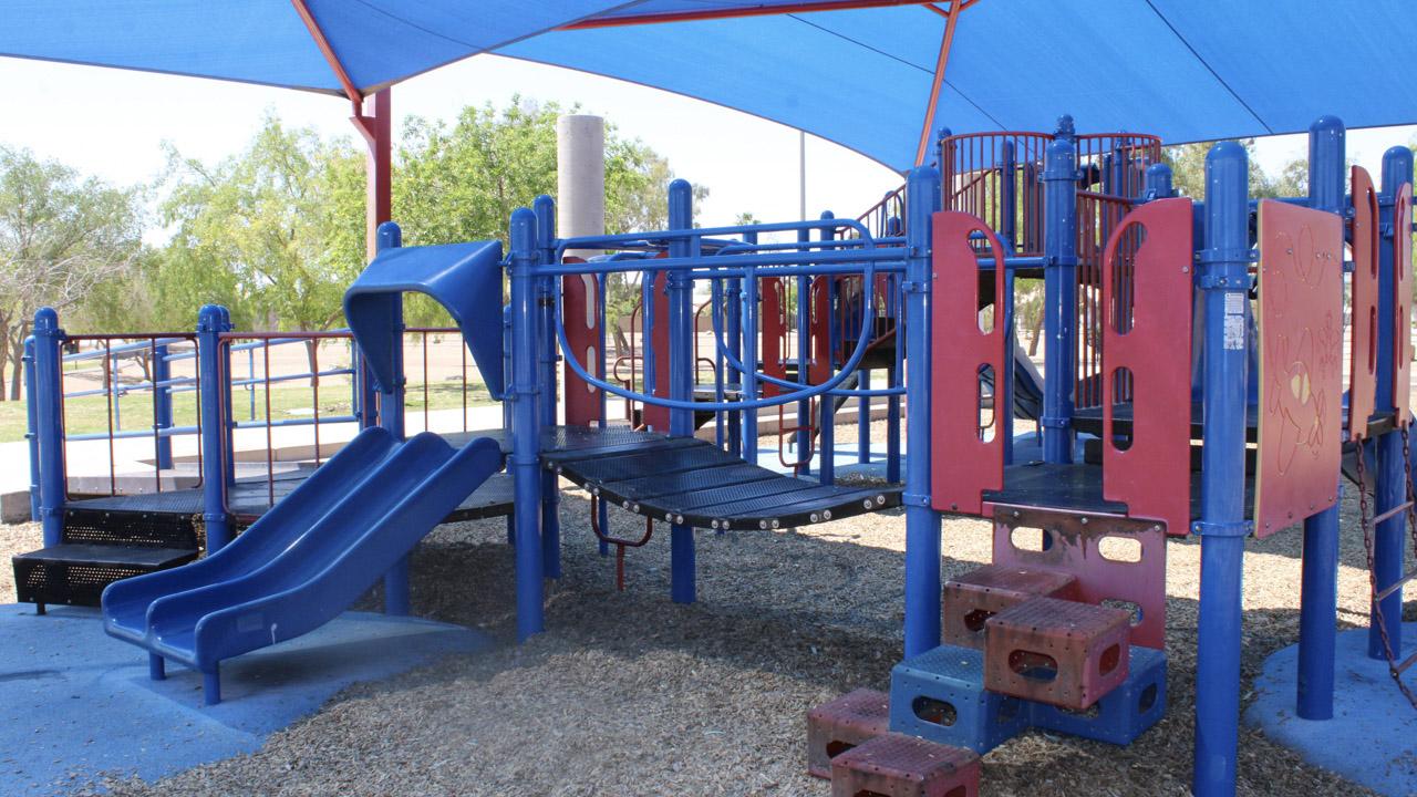 Playground slide and bridge at Pima Park