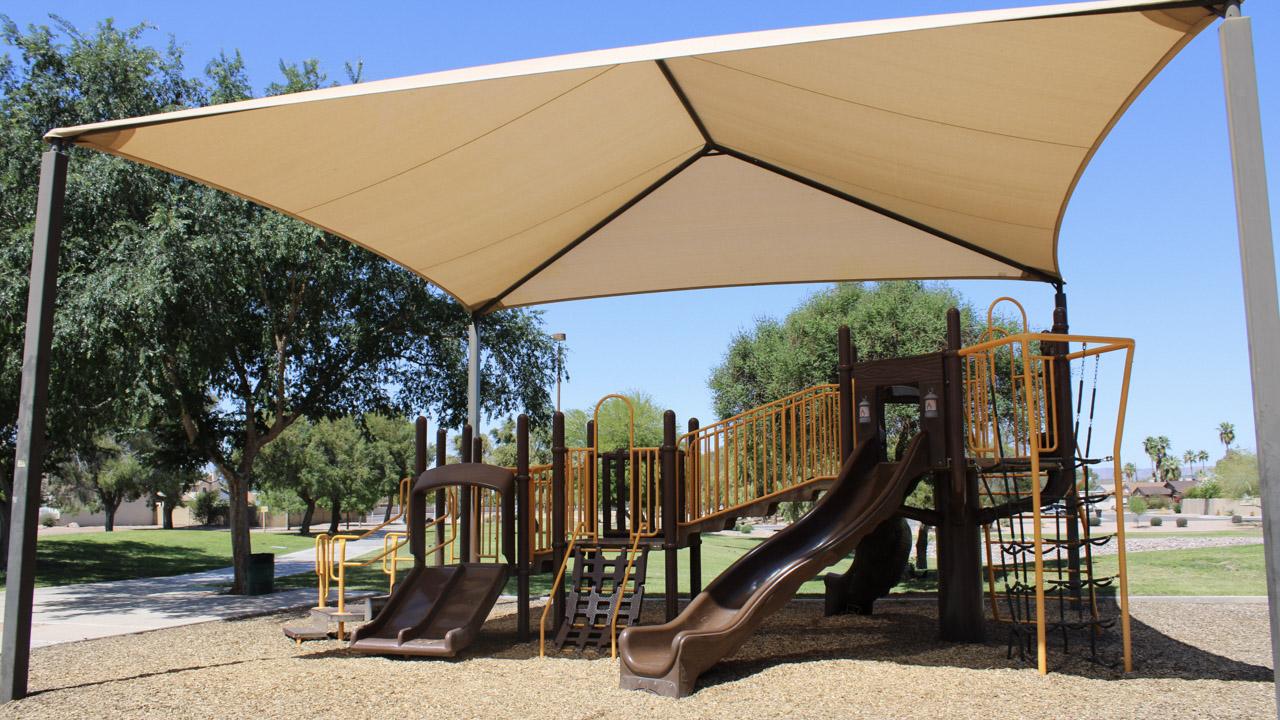 Playground slides and climbing wall at Price Park