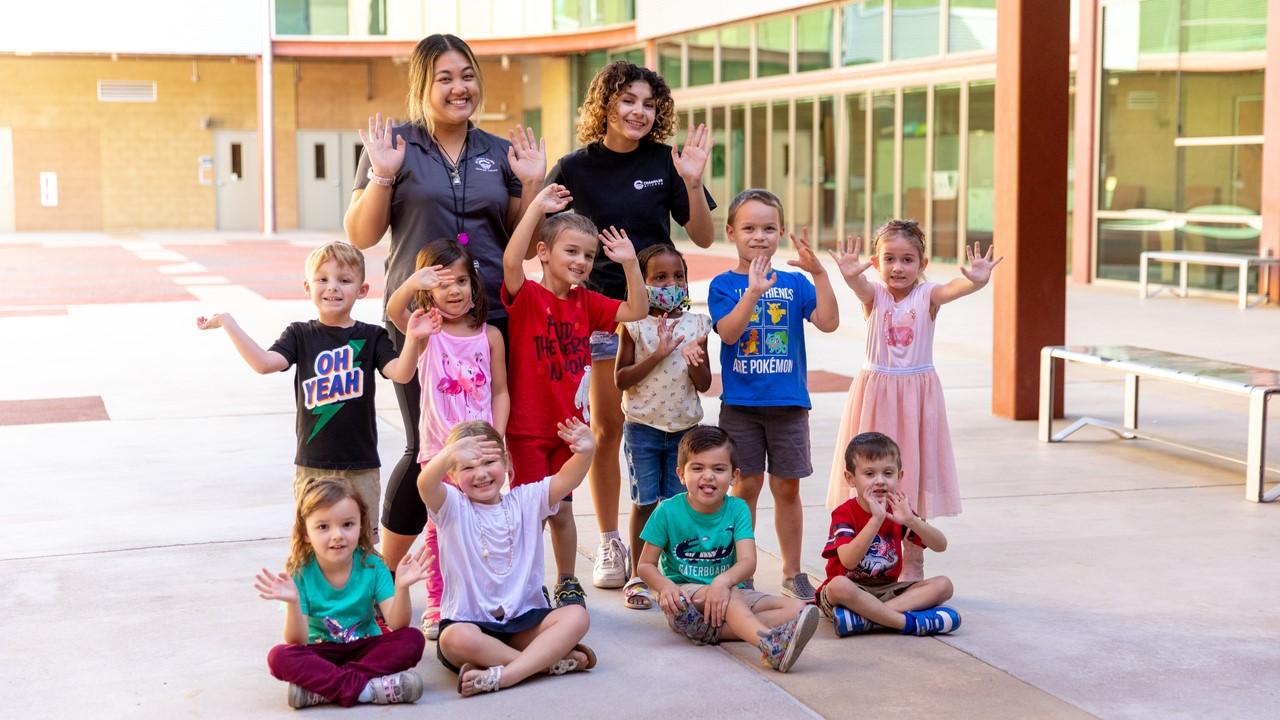 building blocks instructors posing with their class