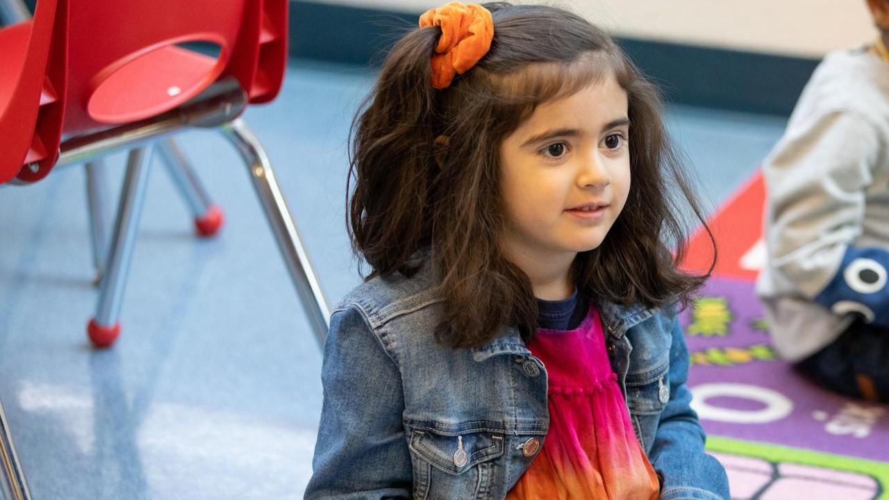 young child learns in building blocks program